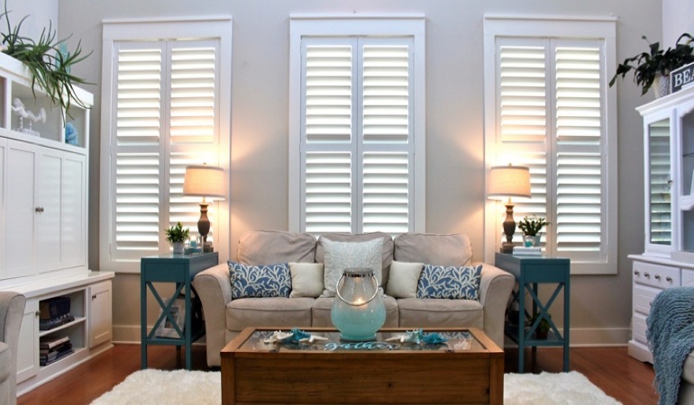Atlanta designer living room with plantation shutters 